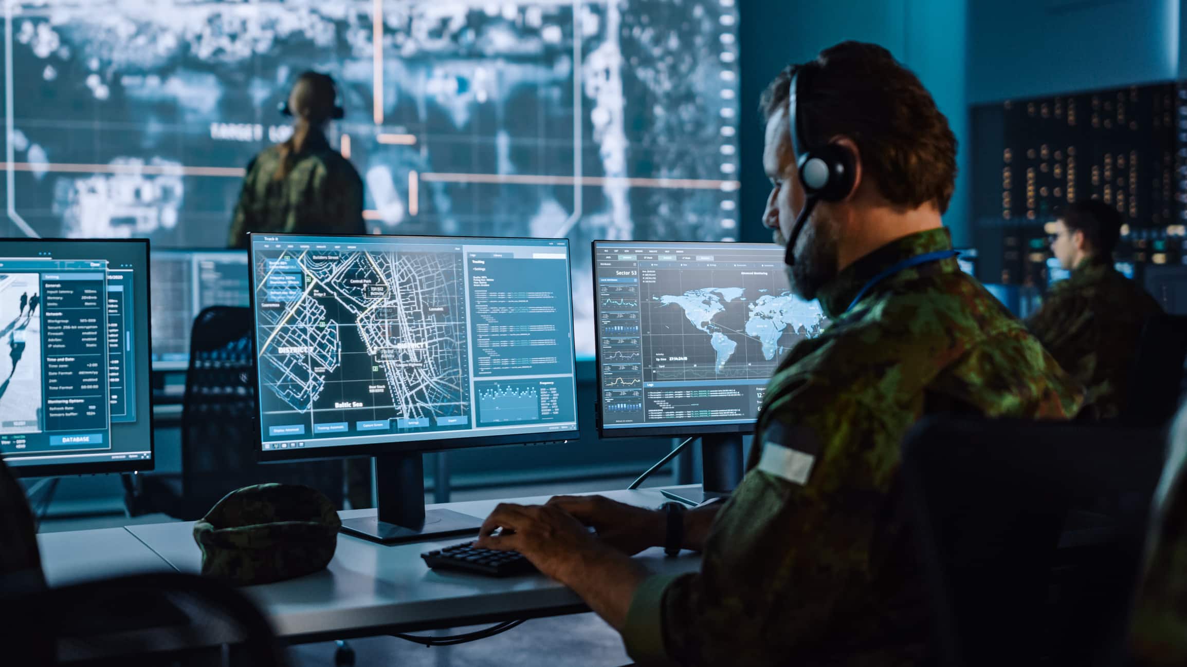 Military Surveillance Officer Working on a City Tracking Operation